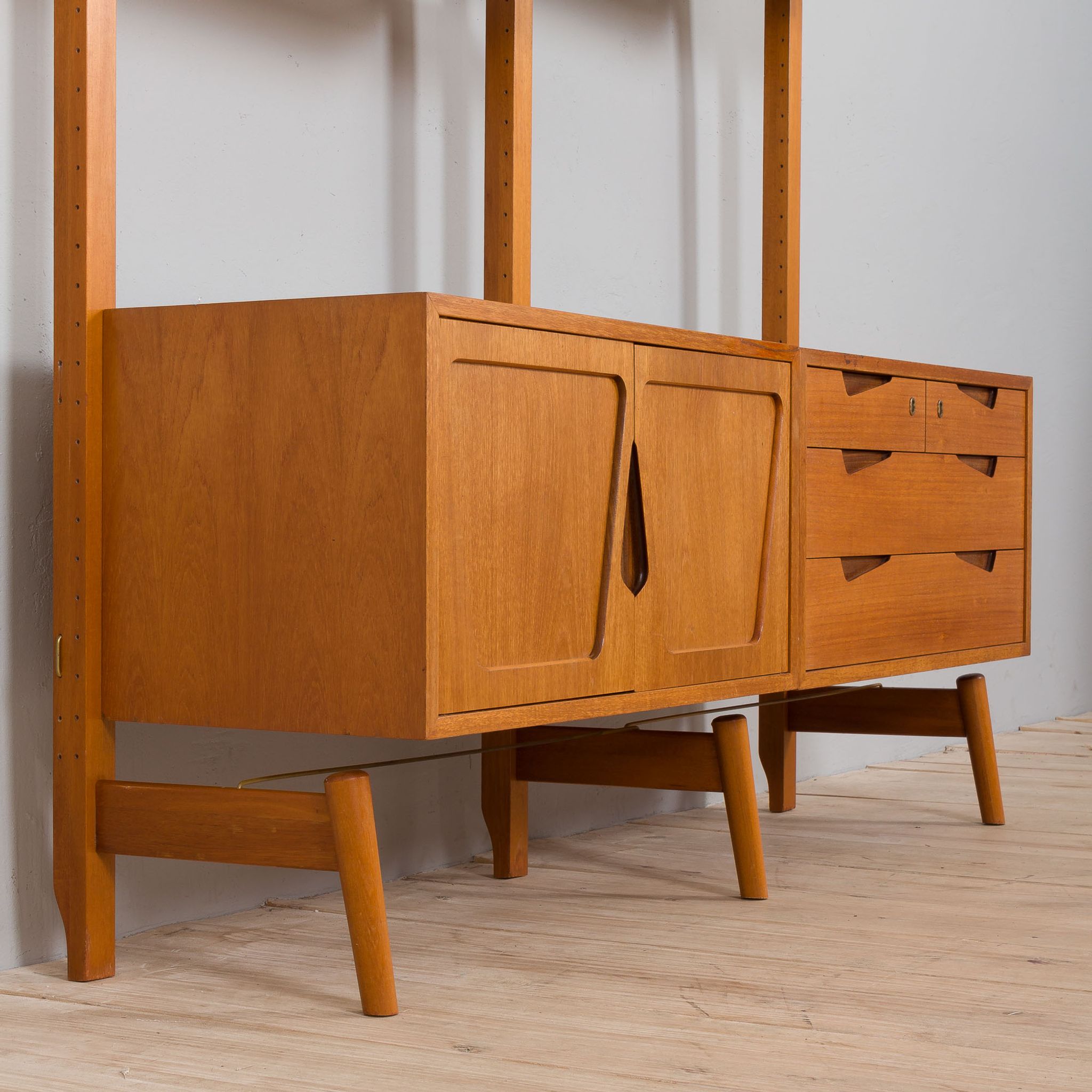 Rival 2 bay free standing teak wall unit with 3 cabinets and 3 shelves by Brodrene Jatogs Norway, Kj