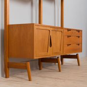 Rival 2 bay free standing teak wall unit with 3 cabinets and 3 shelves by Brodrene Jatogs Norway, Kj
