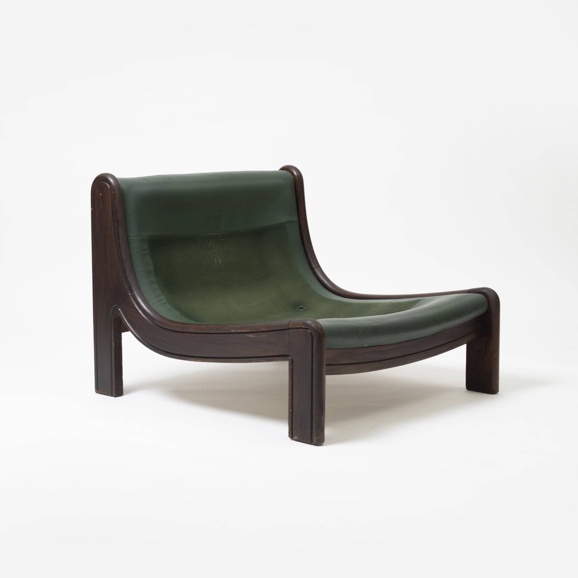 Pair of low sling chairs in hardwood and leather, Germany, 1970s