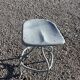Old metal stool from a factory industrial workshop