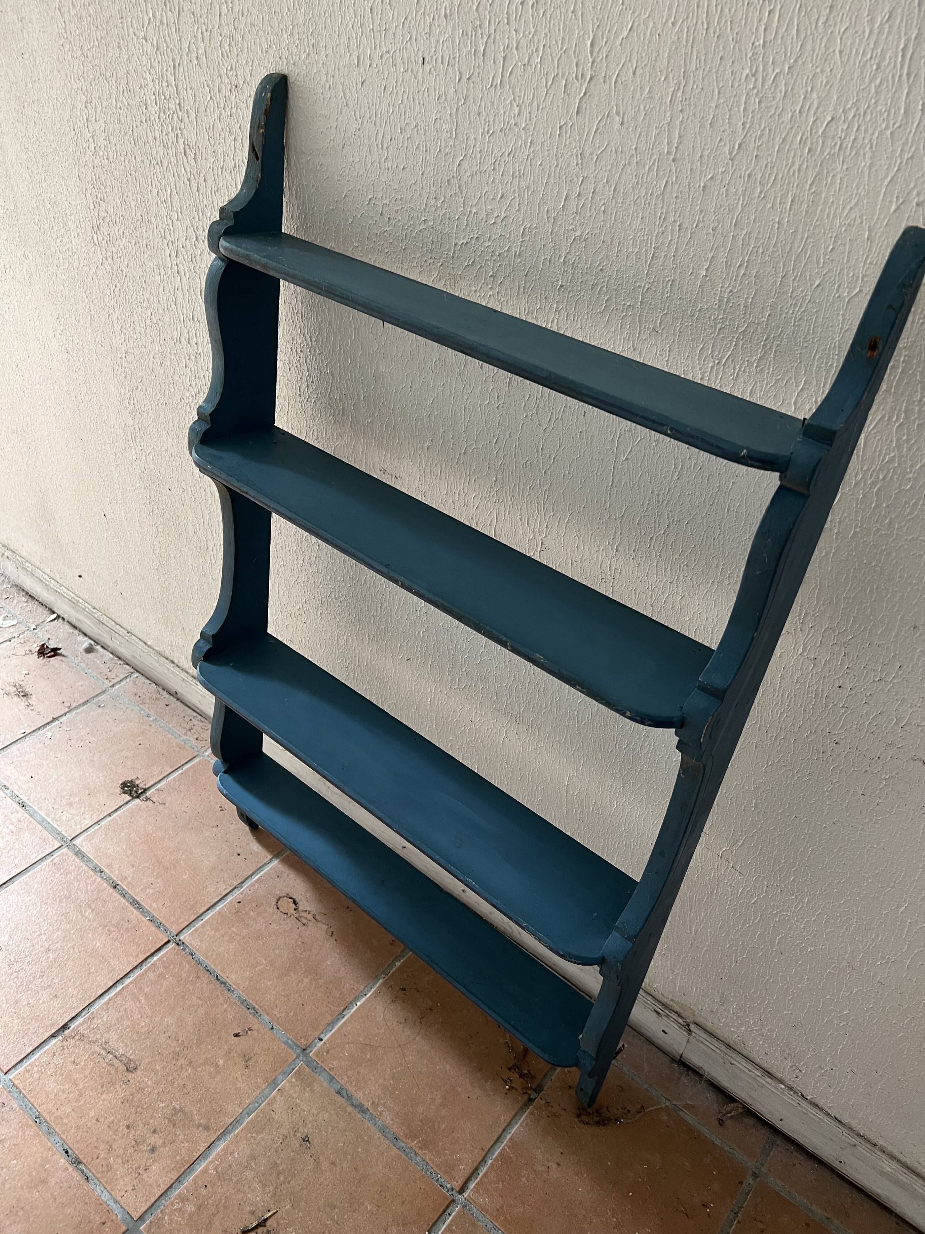 Blue wooden wall shelf