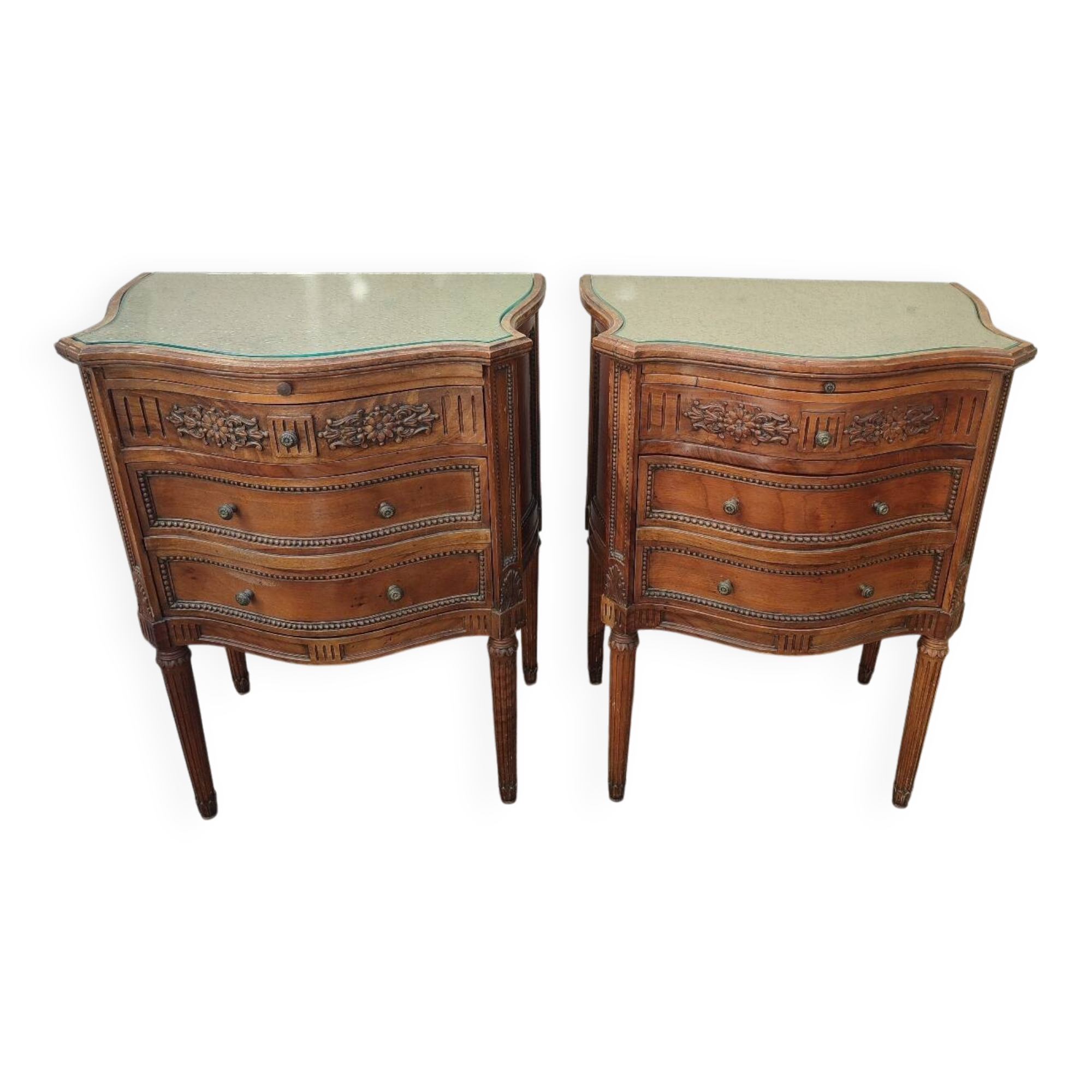 Pair of walnut crossbow chests of drawers