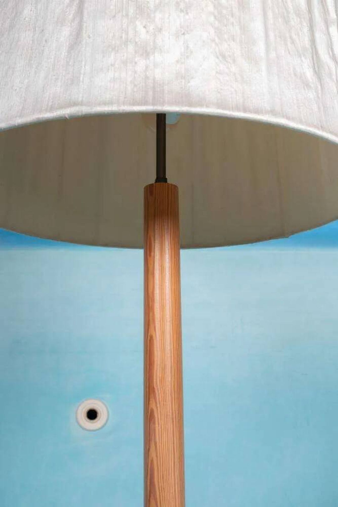Vintage Swedish wooden floor lamp with pleated shade from the 1960s.