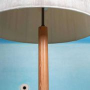 Vintage Swedish wooden floor lamp with pleated shade from the 1960s.