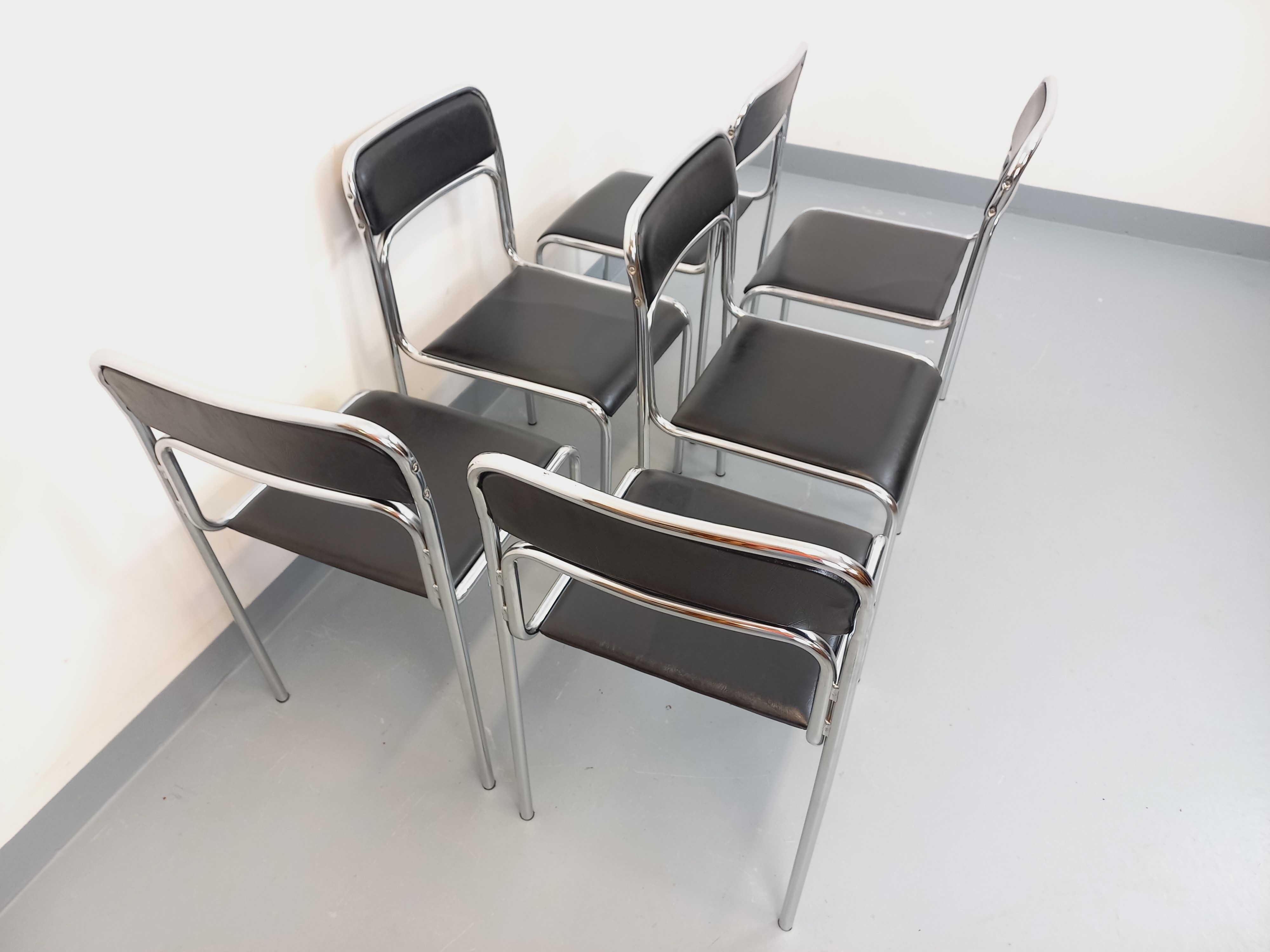 Set of 6 vintage Italian stackable chairs in chrome metal and skai.