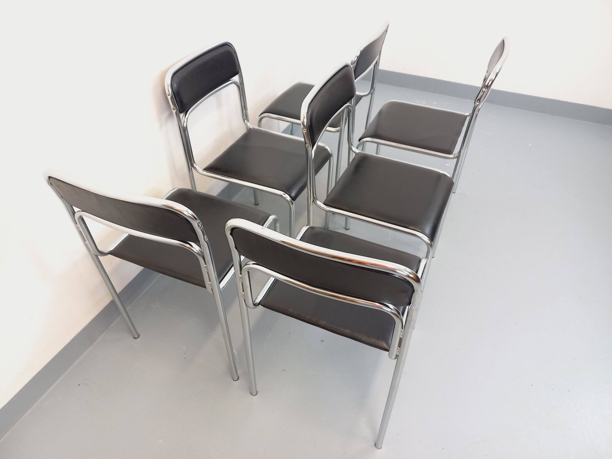 Set of 6 vintage Italian stackable chairs in chrome metal and skai.