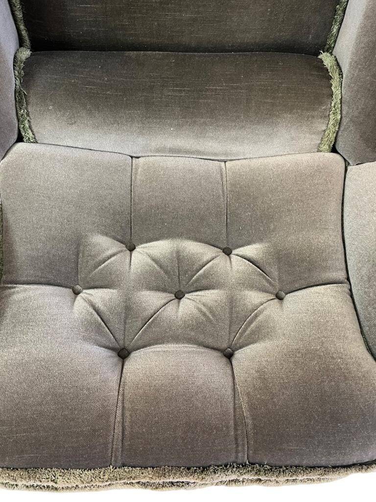 Vintage green club chair with fringes