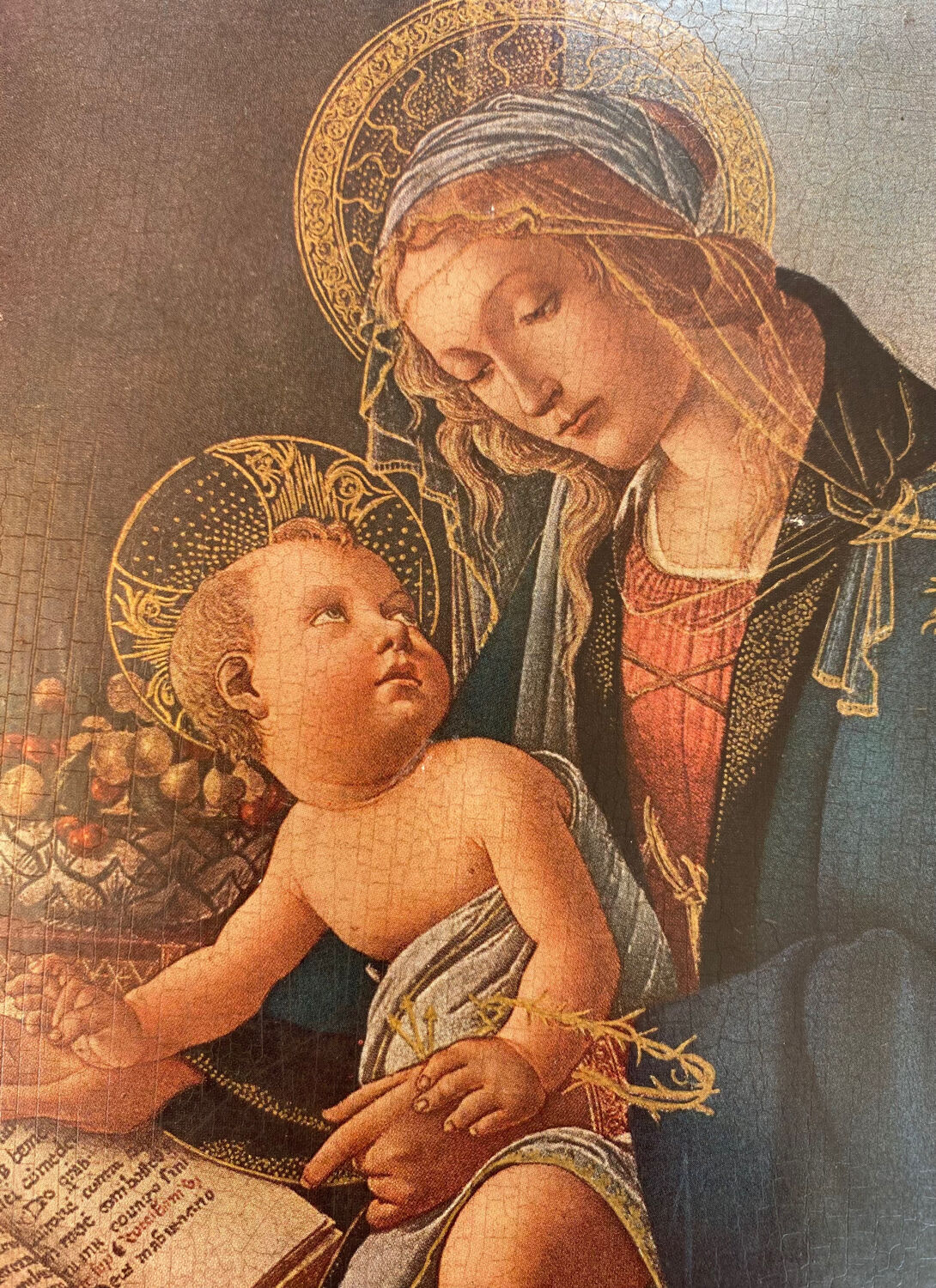Religious icon on gilded wood: The Madonna of the Book
