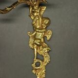 Pair of large Louis XV style wall lights - gilded bronze