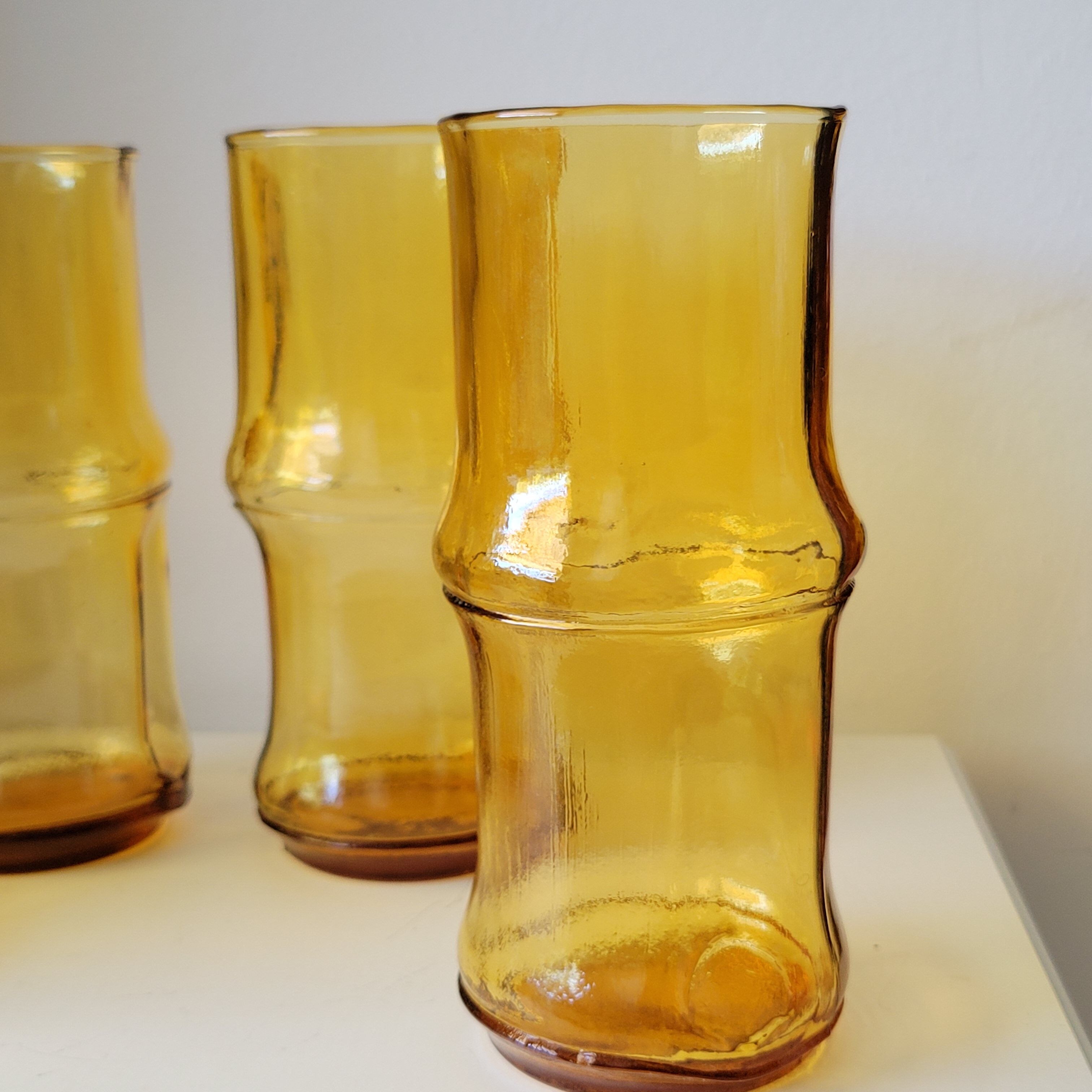 4 vintage orangeade glasses in yellow glass in the shape of bamboo