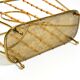 Rare Mid Century Modern magazine rack made of solid brass and genuine bambo