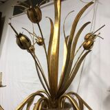 Golden chandelier of the 70s joncs decorations