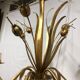 Golden chandelier of the 70s joncs decorations