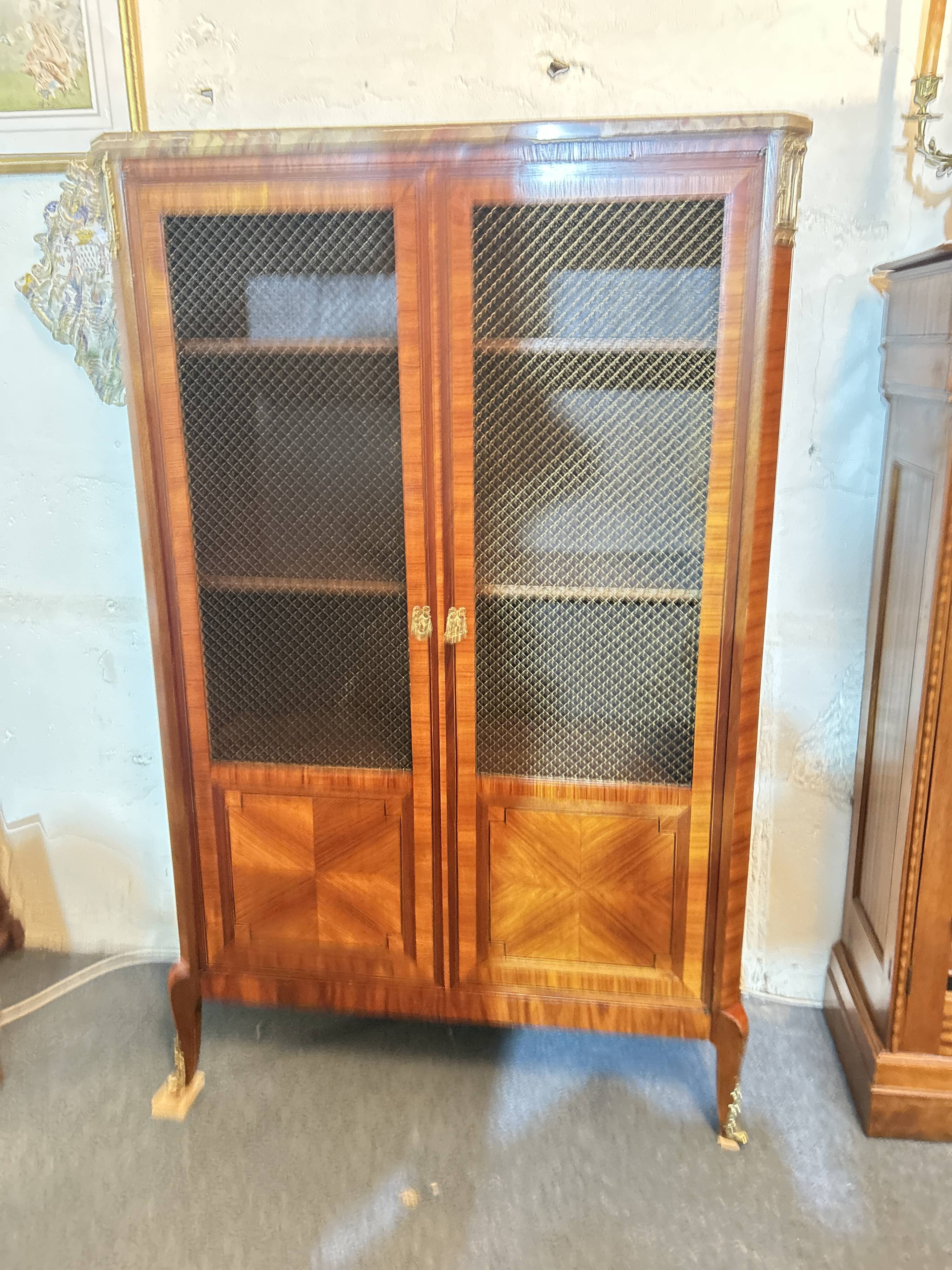 Directoire style display cabinet with two doors