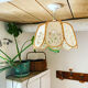 Vintage suspension lamp in rattan and lace