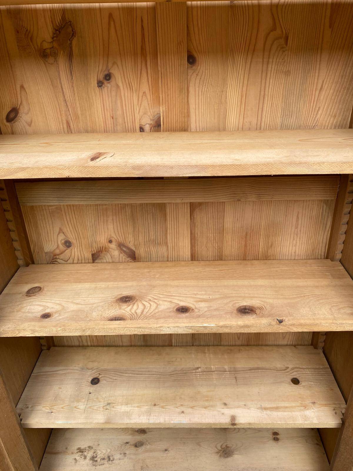 Parisian bonnetière cabinet, stripped display in solid oak from the 1930s.