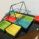 Black metal appetizer set with colorful ceramic ramekins