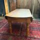 Oval drop-leaf coffee table