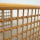 Table basse en travertin et en rotin