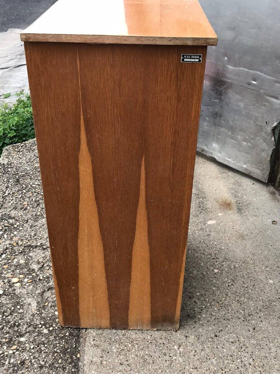 Brown lacquered wooden industrial cabinet with sliding curtain, 1950s, Czech Republic.