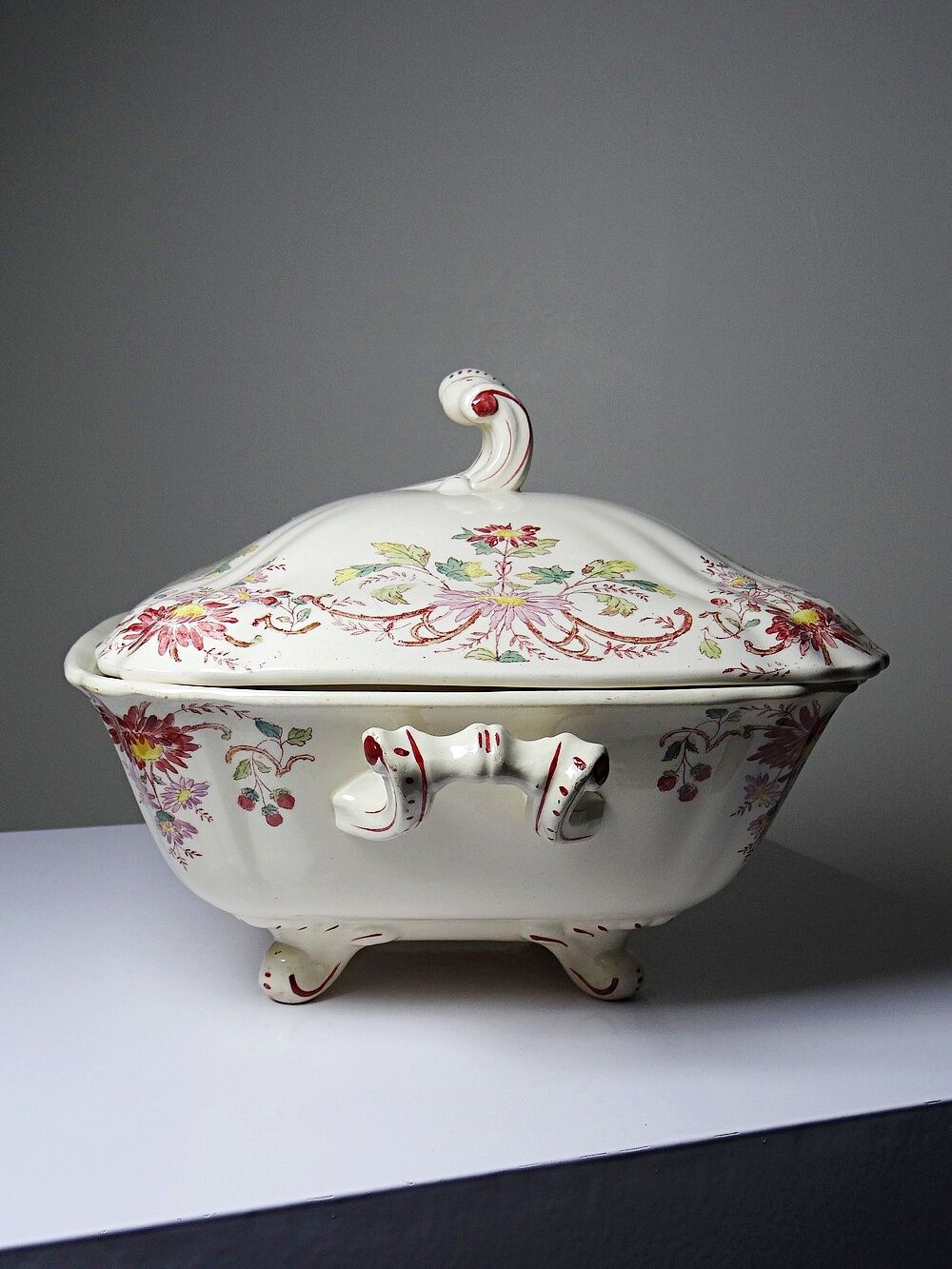 Antique Longchamp soup tureen/vegetable dish with polychrome daisies in ironstone.