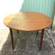 Ancienne table à manger scandinave en bois de teck et pieds compas avec rallonges vintage