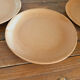 3 assiettes plates en grès 