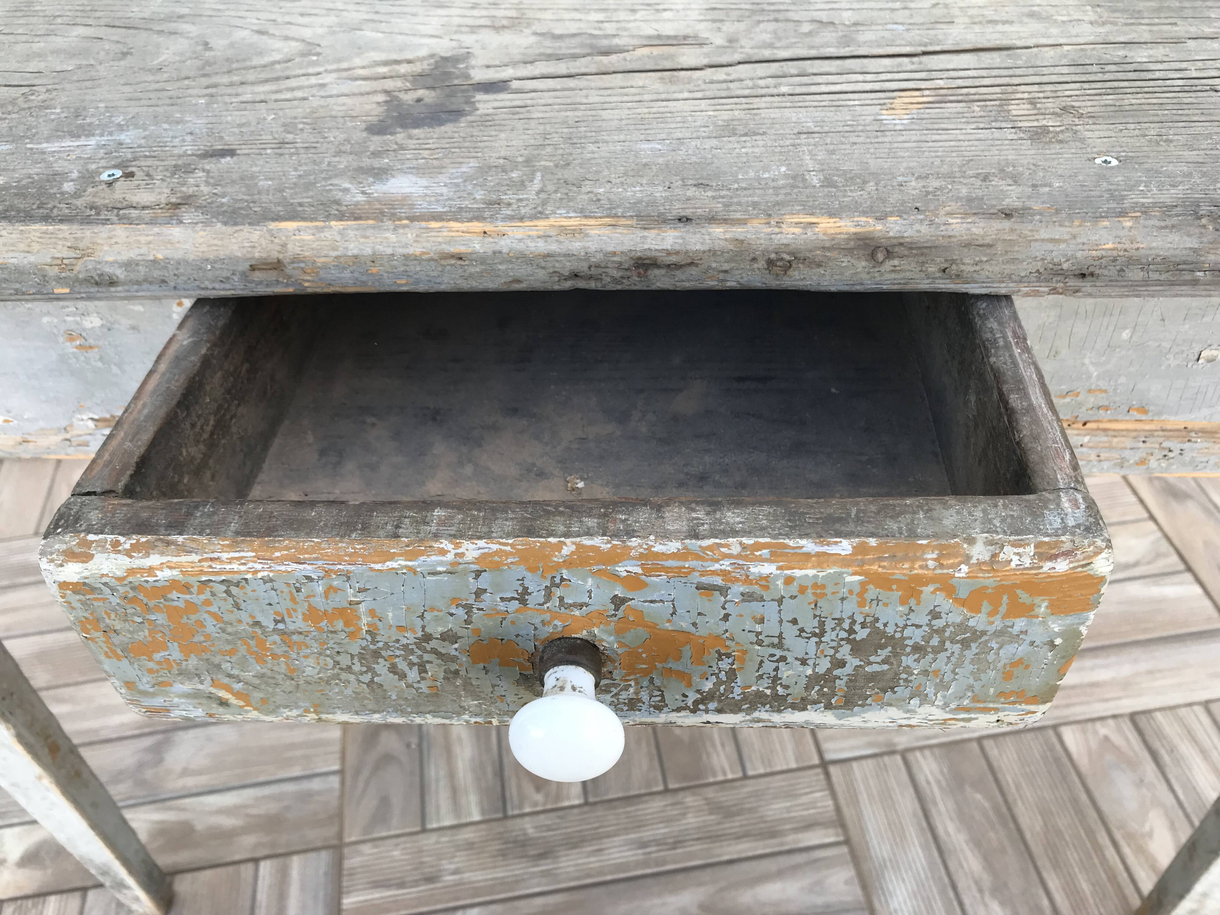 Side table in painted wood aged and patinated by time