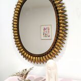 Miroir solaire vintage en métal doré 1960