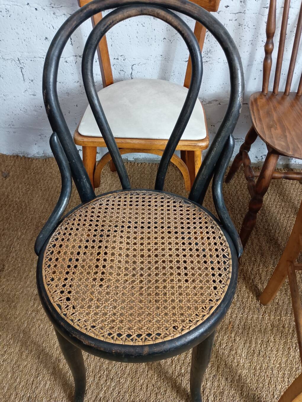 Set of 8 mismatched vintage Baumann Lebrun bistro chairs.