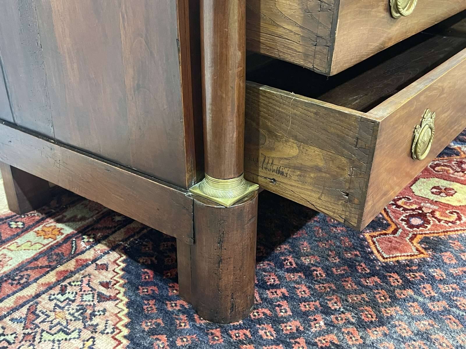 19th century Empire chest of drawers in cherry wood and black marble