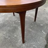 Round teak dining table