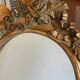 Round carved wooden mirror