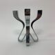 A chromed metal candle-holder "Chorus", design Karim Rashid, executed by Umbra / USA 2002