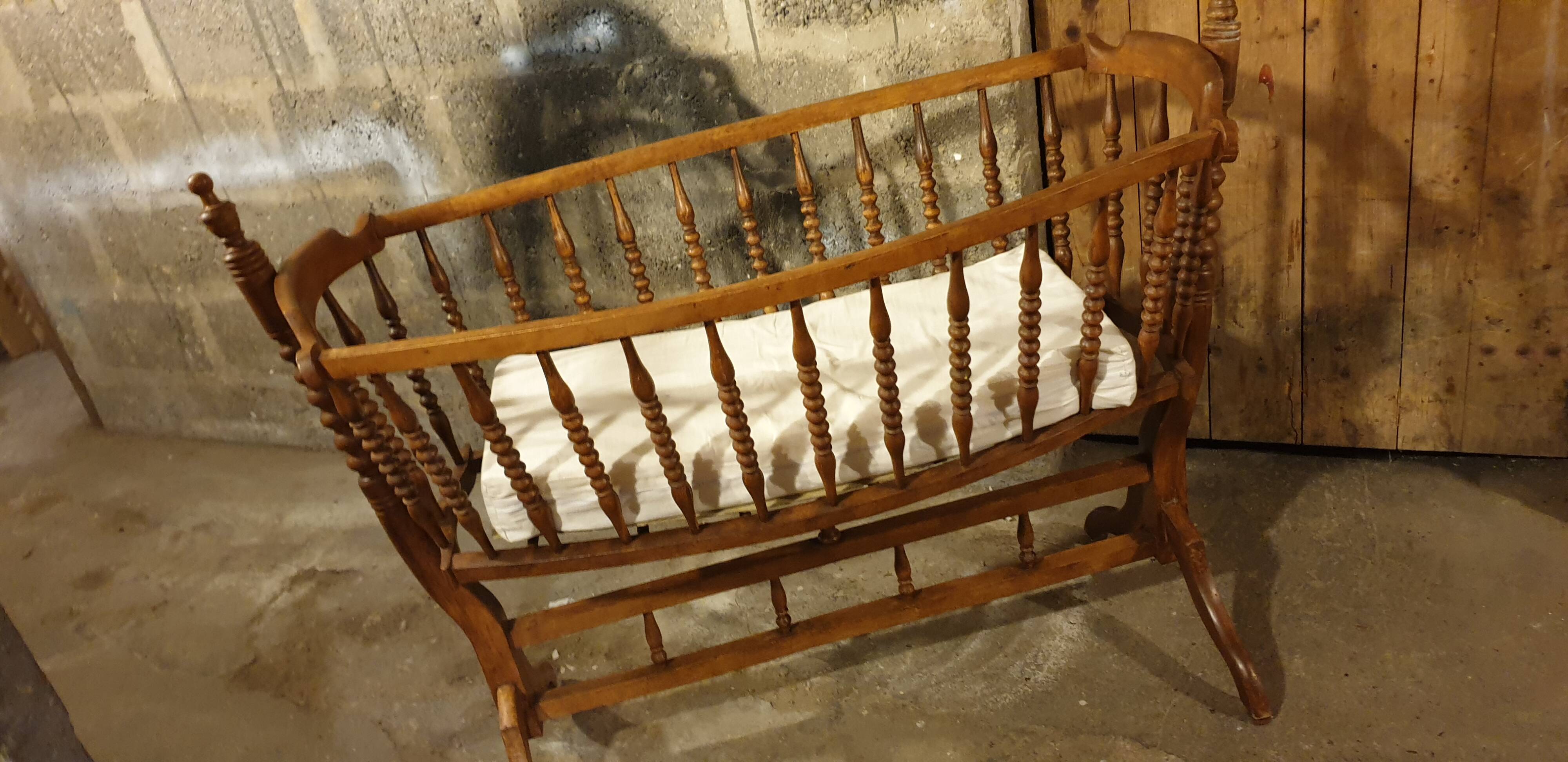 Turned wooden cradle half 20th century