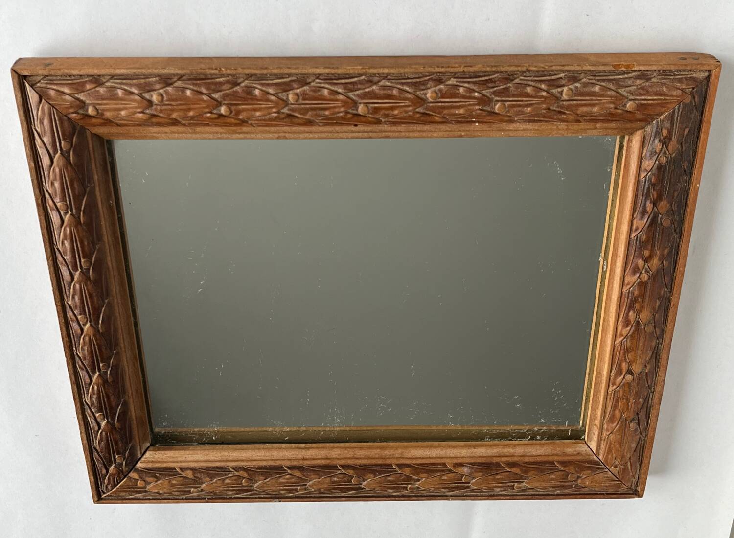 Antique carved wooden mirror