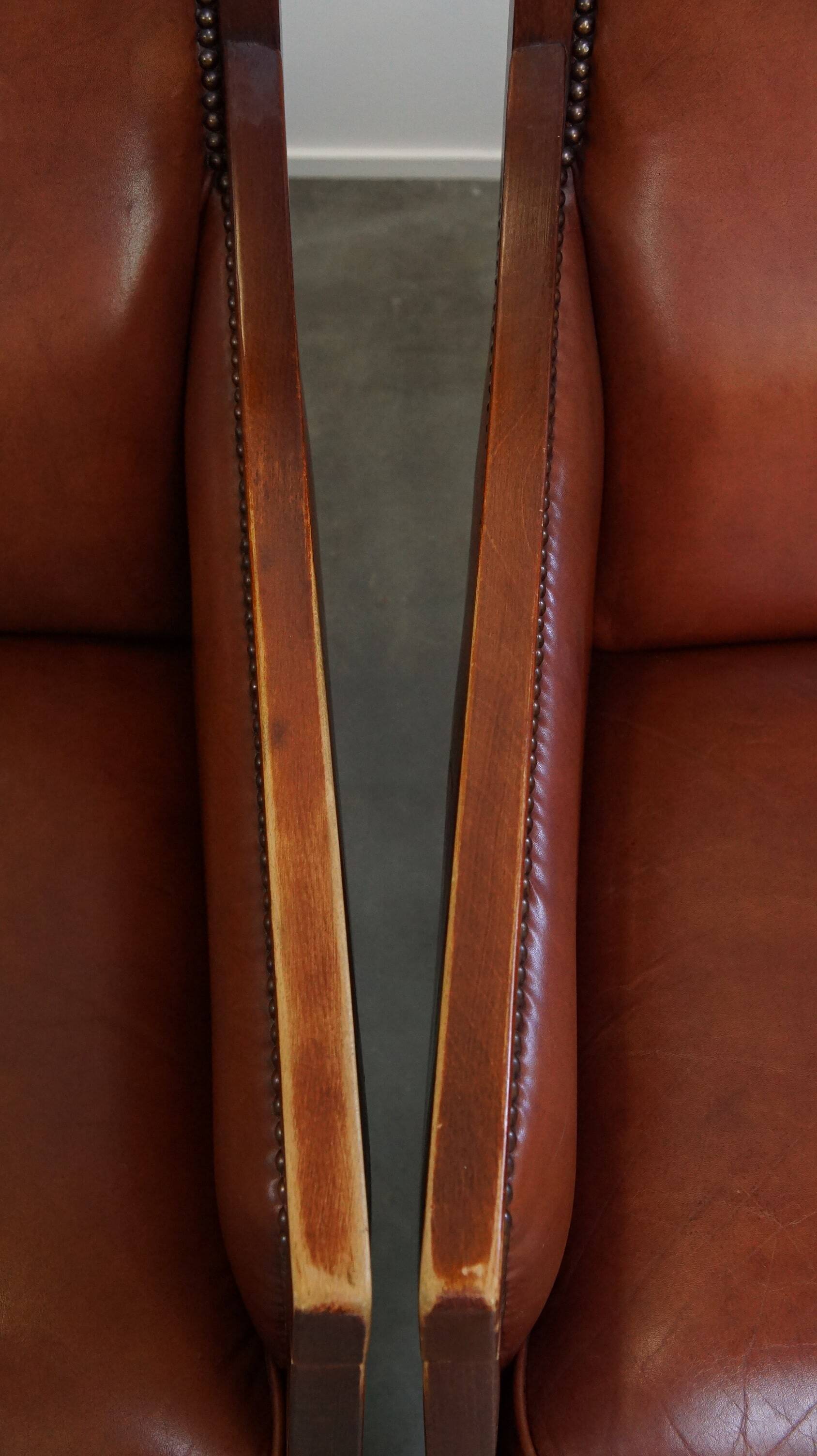 Ensemble majestueux et luxueux de 4 fauteuils design Art Déco en cuir de vachette couleur cognac