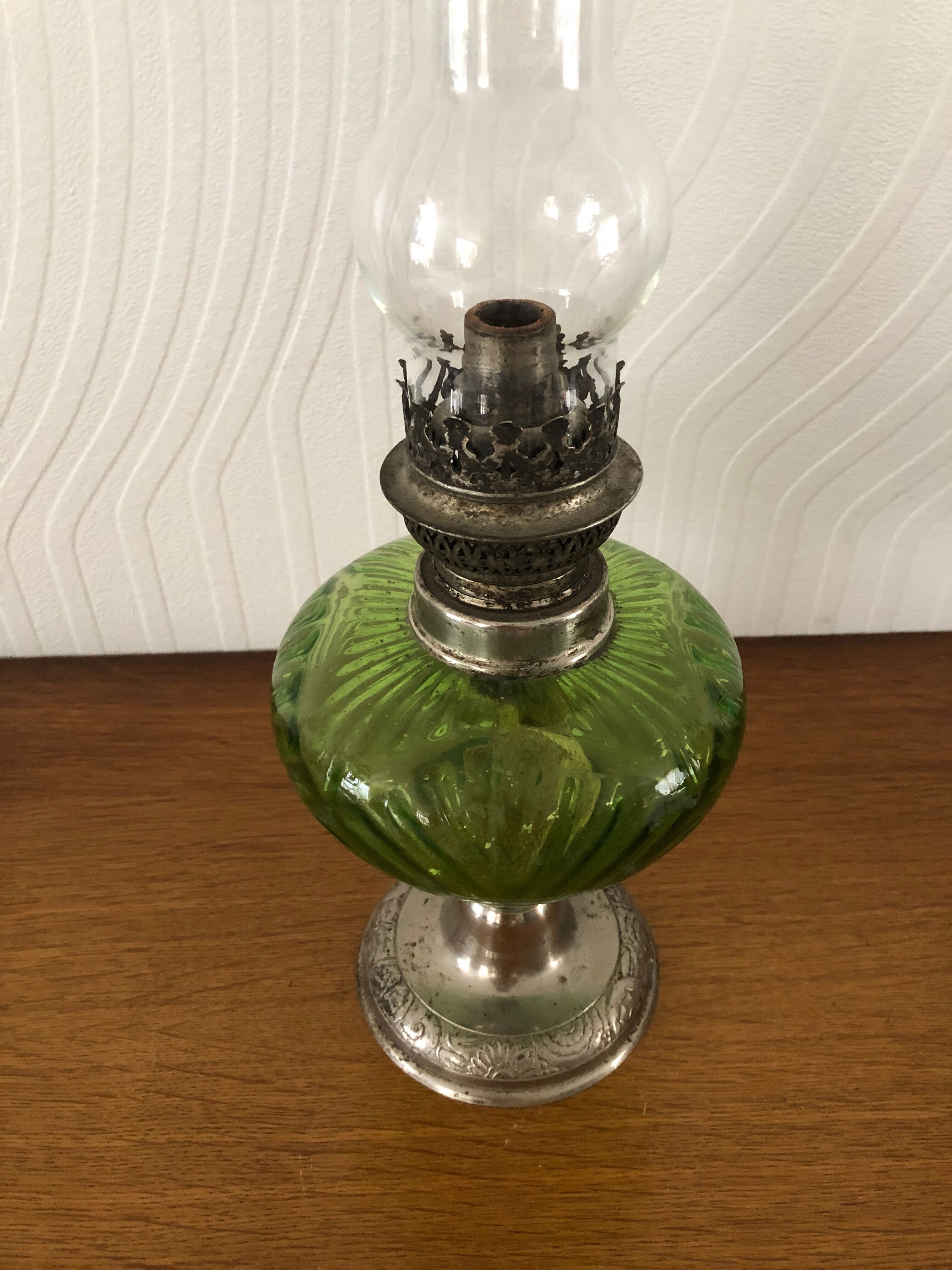 Antique oil lamp in glass and metal