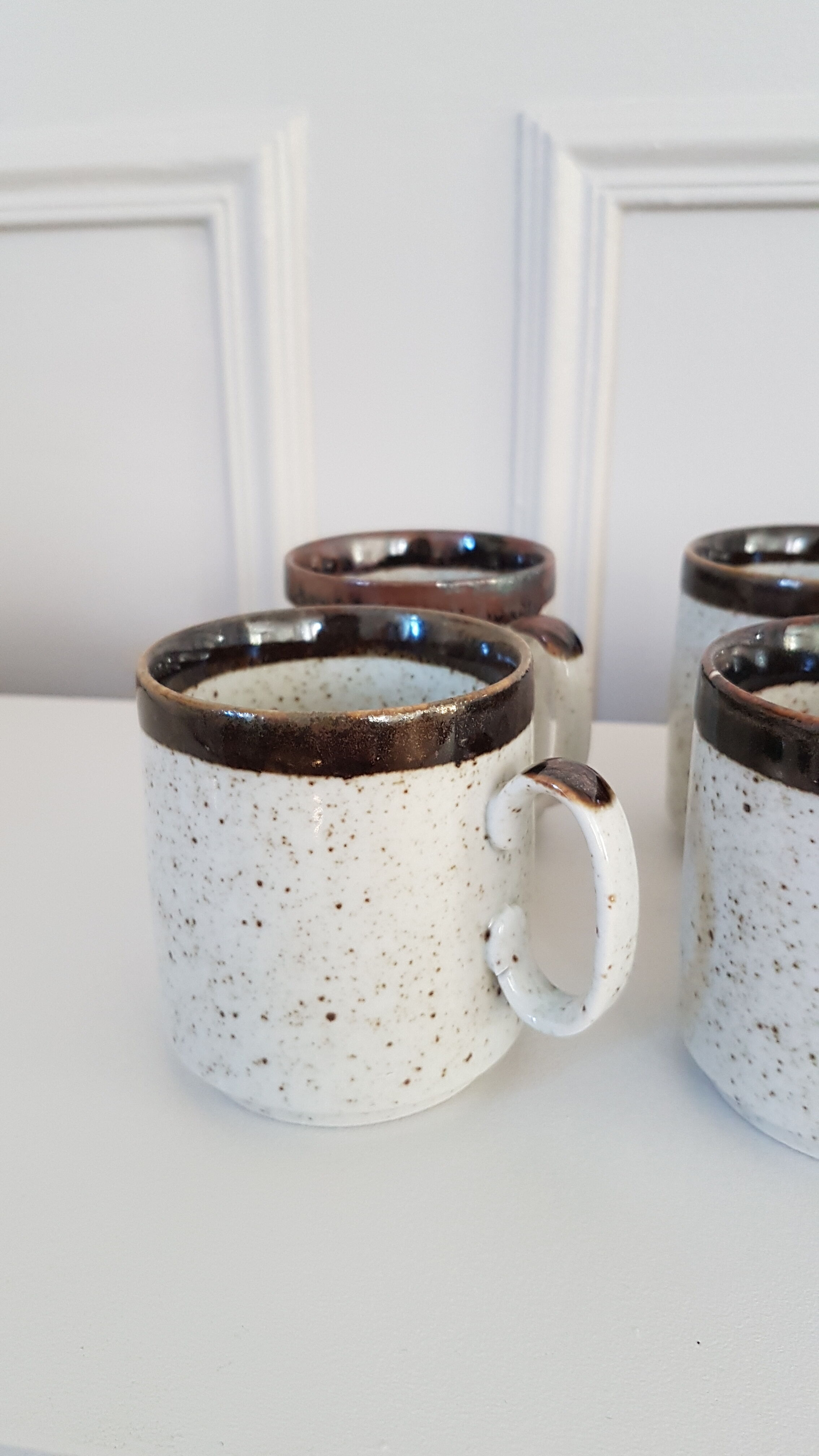 Six stoneware mugs