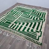 Handmade Moroccan rug from Oued Zam, size 150 x 250 cm.