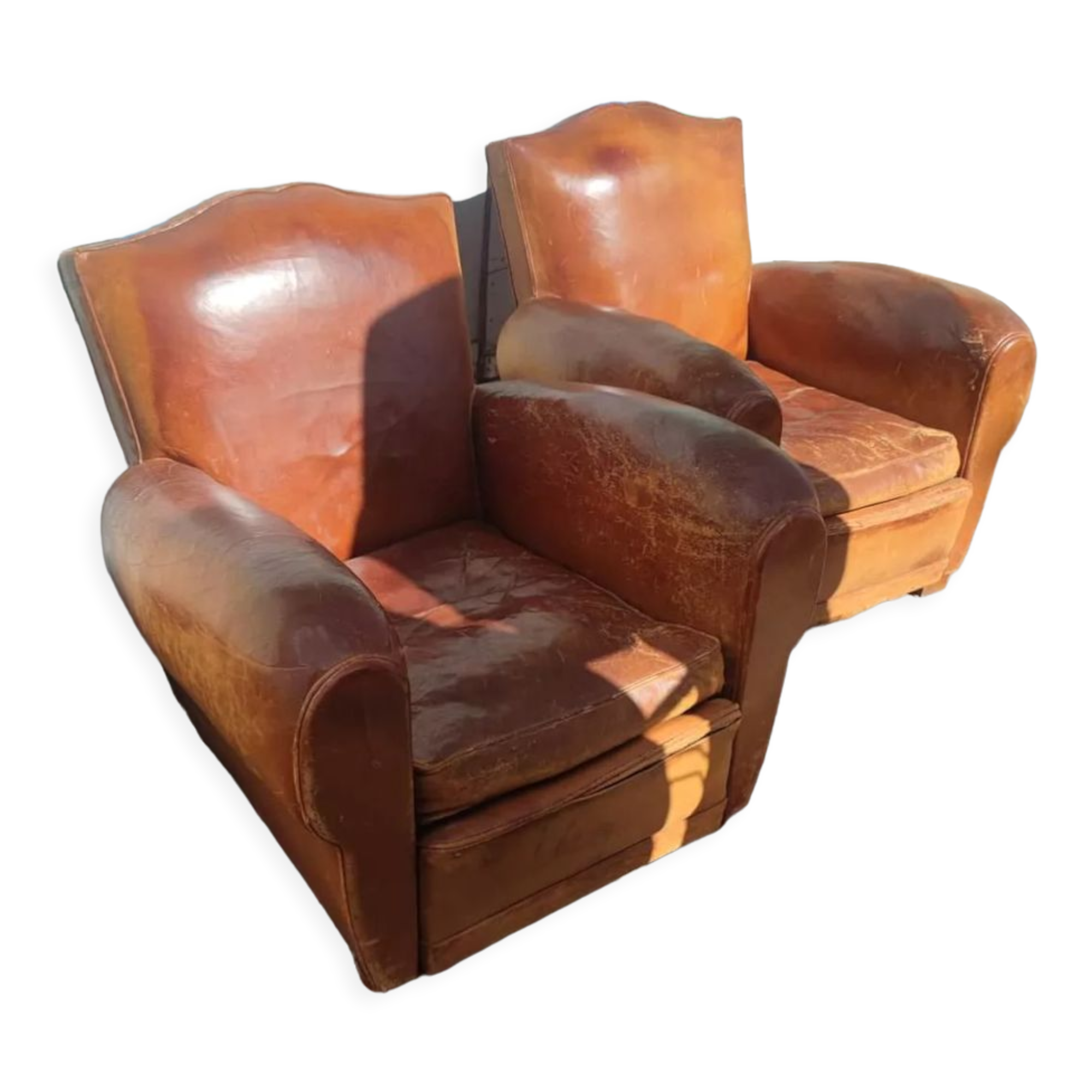 Pair of club chairs with moustache-shaped handles in Havana leather, in their original condition, circa 1930