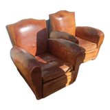 Pair of club chairs with mustaches in havana leather in their juices circa 1930