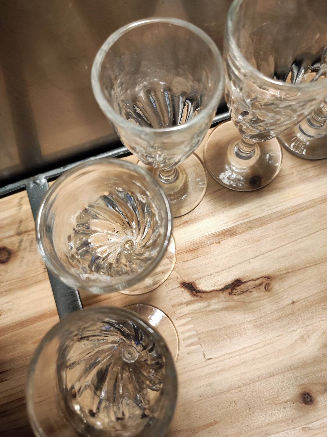 12 small twisted bistro glasses, 19th century