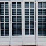 Suite de quatre portes de passage a petits carreaux XX siècle