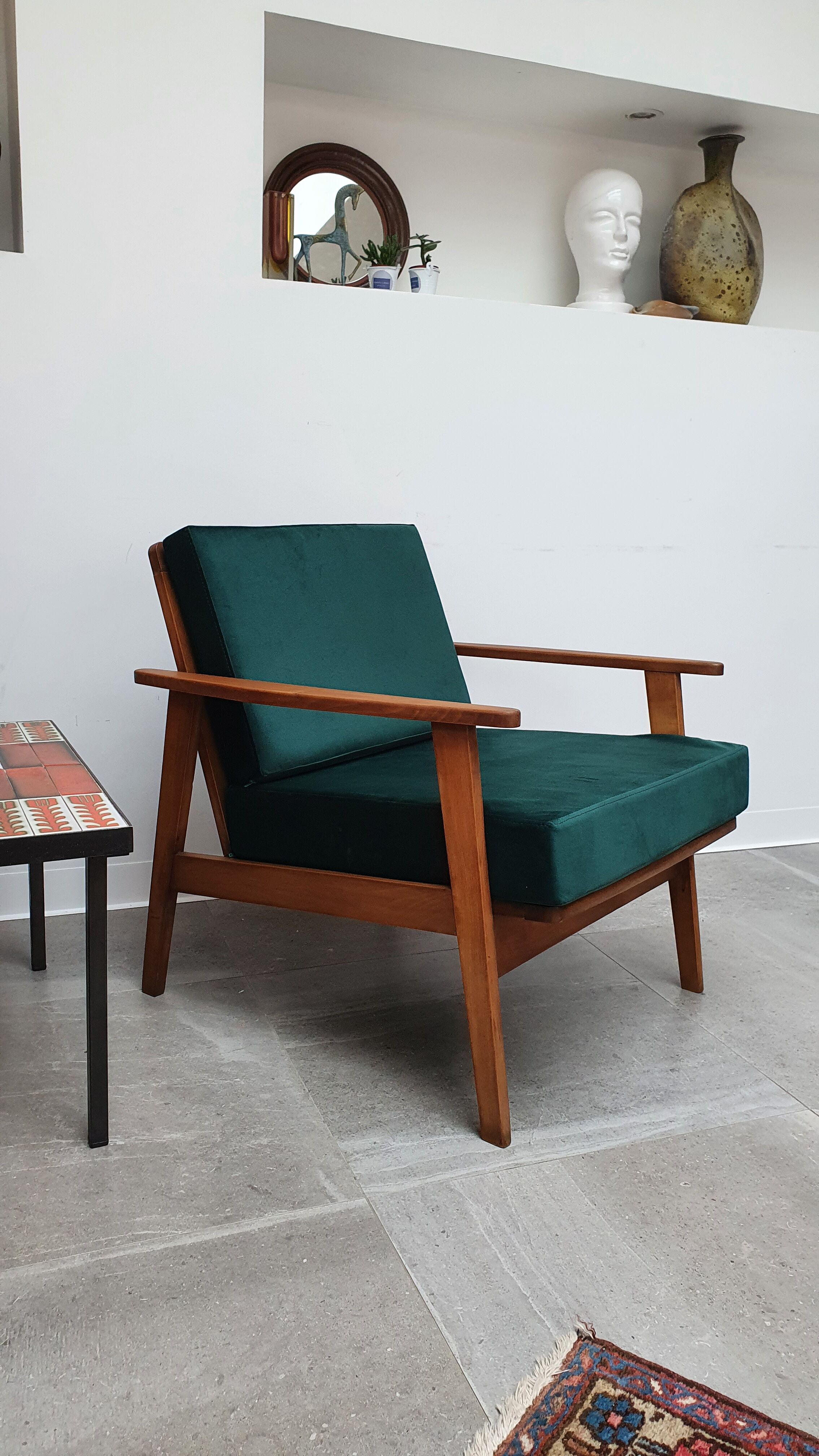 Scandinavian style armchair in forest green velvet