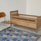 Children's bed in wood and sandblasted rattan from the 1960s.