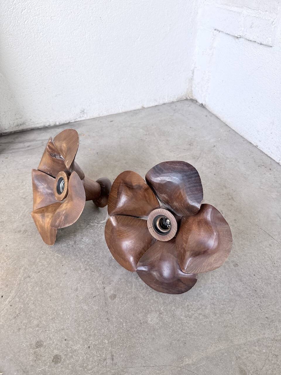 Pair of wooden flower wall lights from the 1970s.