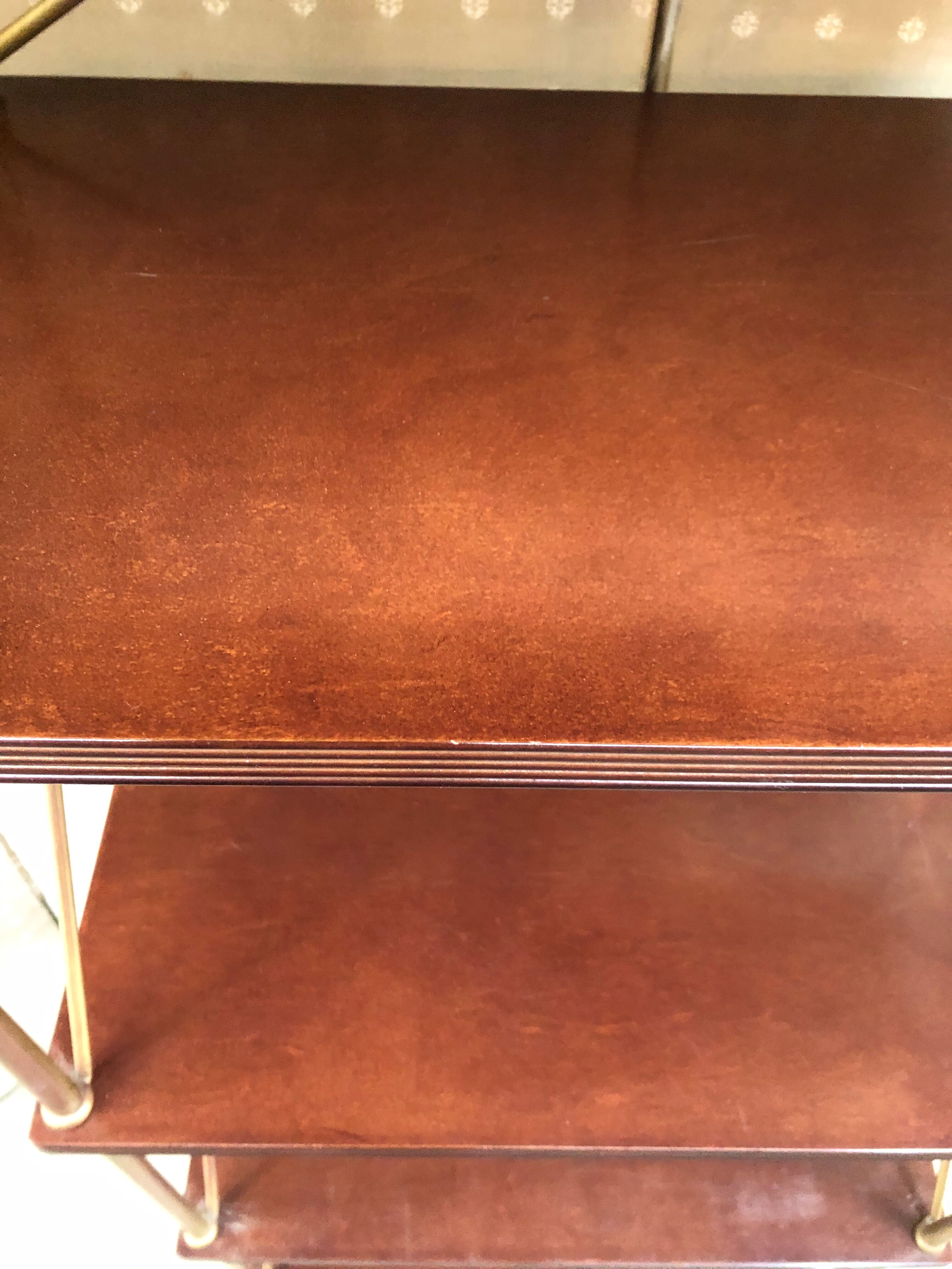 Mahogany and gold metal shelf