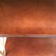 Mahogany and gold metal shelf