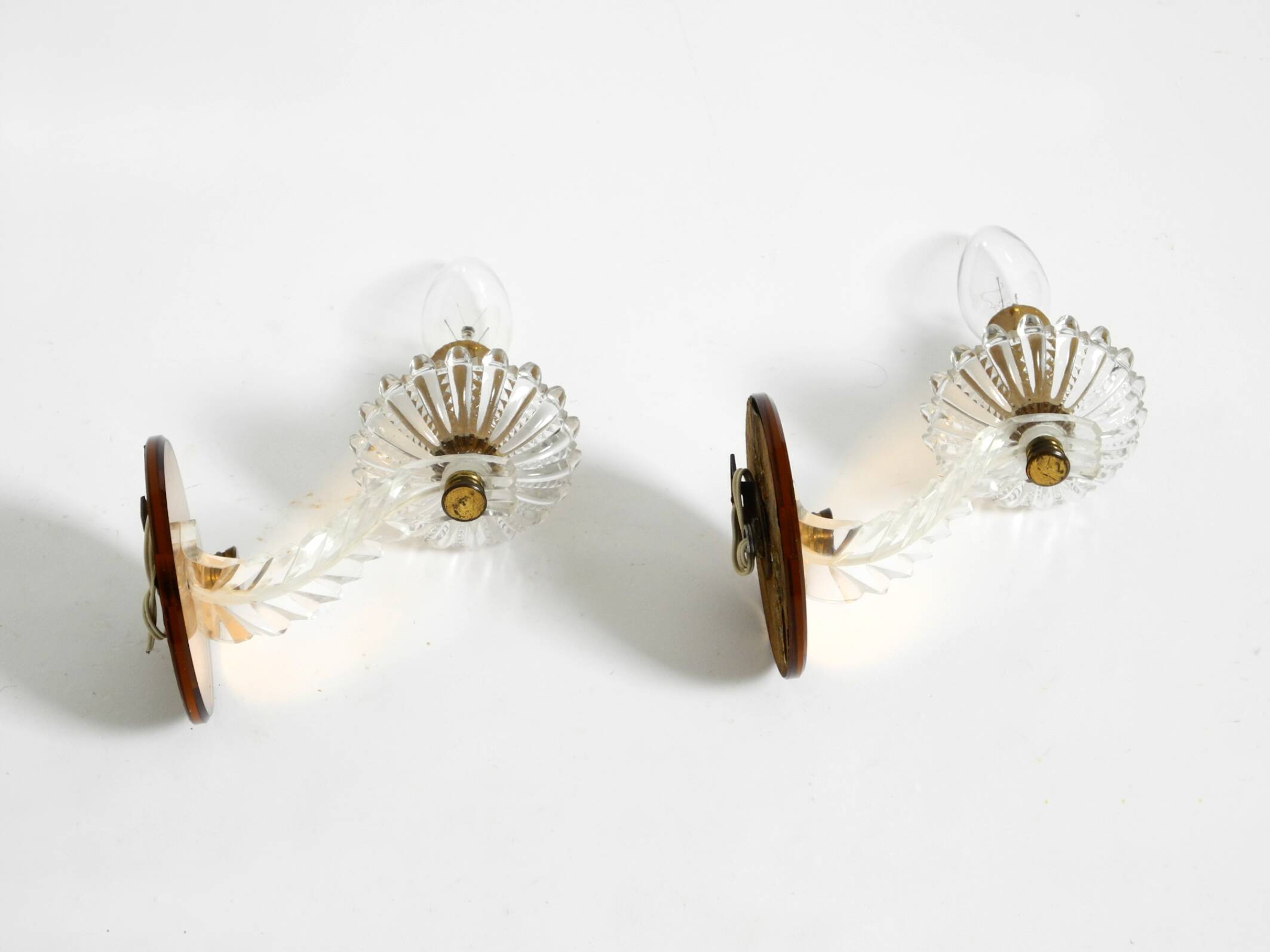 Two original Italian 1960s wall lamps with glass and mirror components